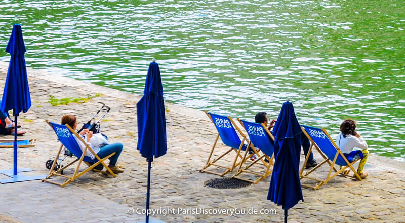 Enjoying Paris Plages from a "beach" overlooking the Seine Enjoying Paris Plages from a "beach" overlooking the Seine