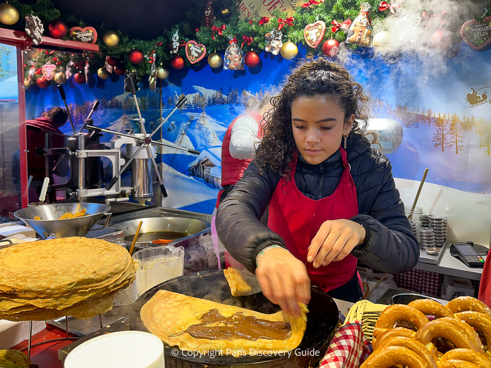 Freshly made crepe filled with nutella at a market stand in the Latin Quarter