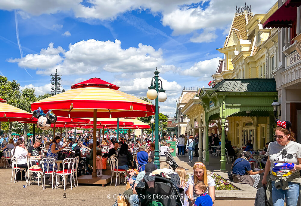 Terrace seating by a casual Disneyland Paris bistro