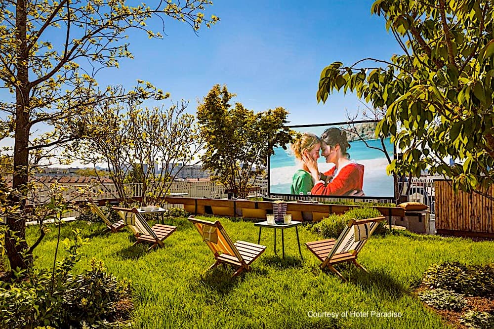 The rooftop terrace with viewing screen at Hotel Paradiso The rooftop terrace with viewing screen at Hotel Paradiso