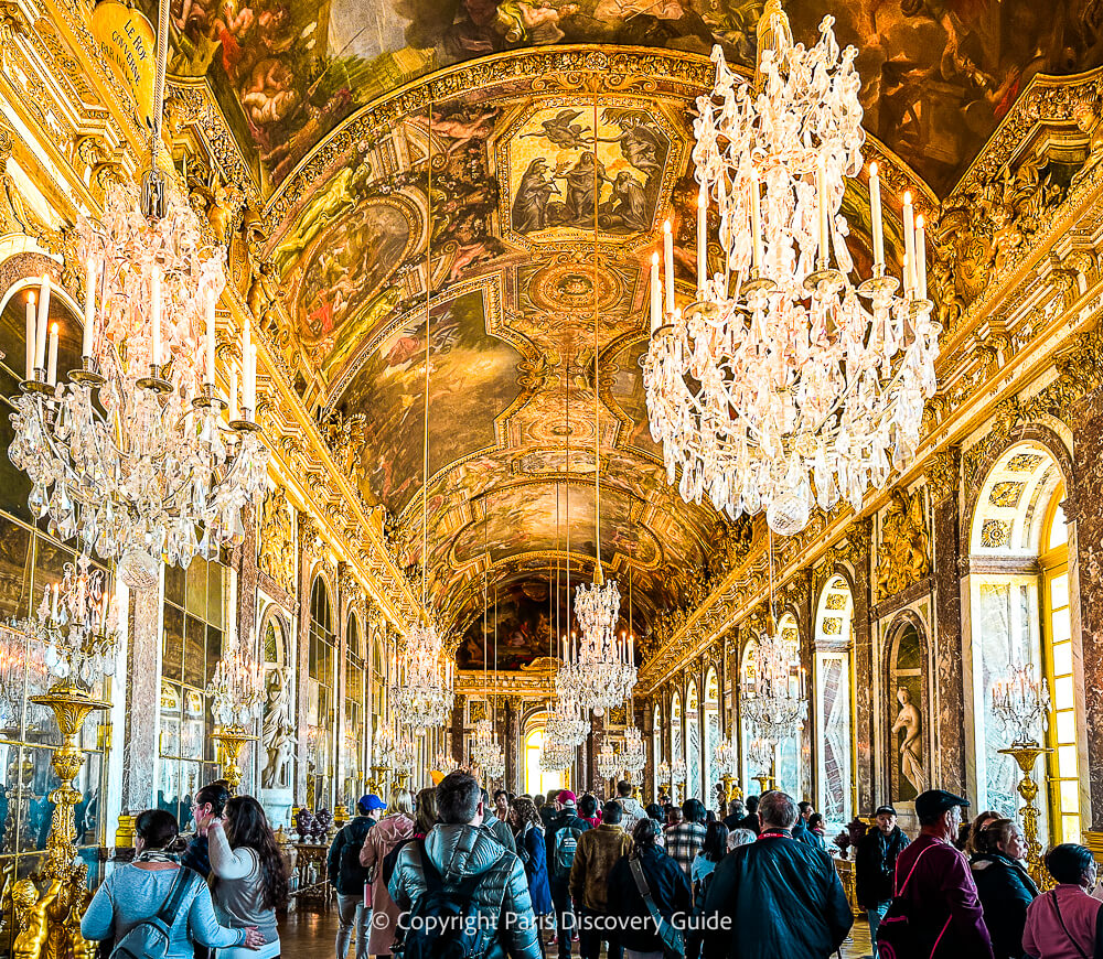 Versailles visitors explore the Hall of Mirrors