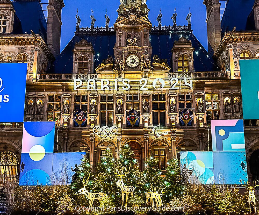 The Hotel de Ville Christmas Market displays a Paris 2024 theme as the city anticipates next summer's Olympics events