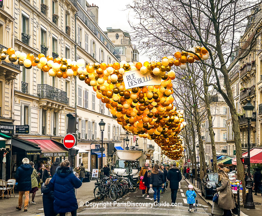 Rue des Martyrs becomes Rue des Bulles to celebrate Champagne and Christmas