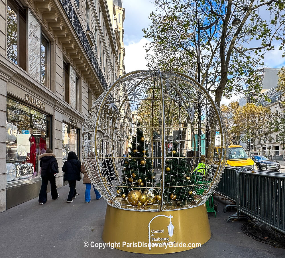 Christmas sidewalk display on Rue Royal near Place de la Madeleine