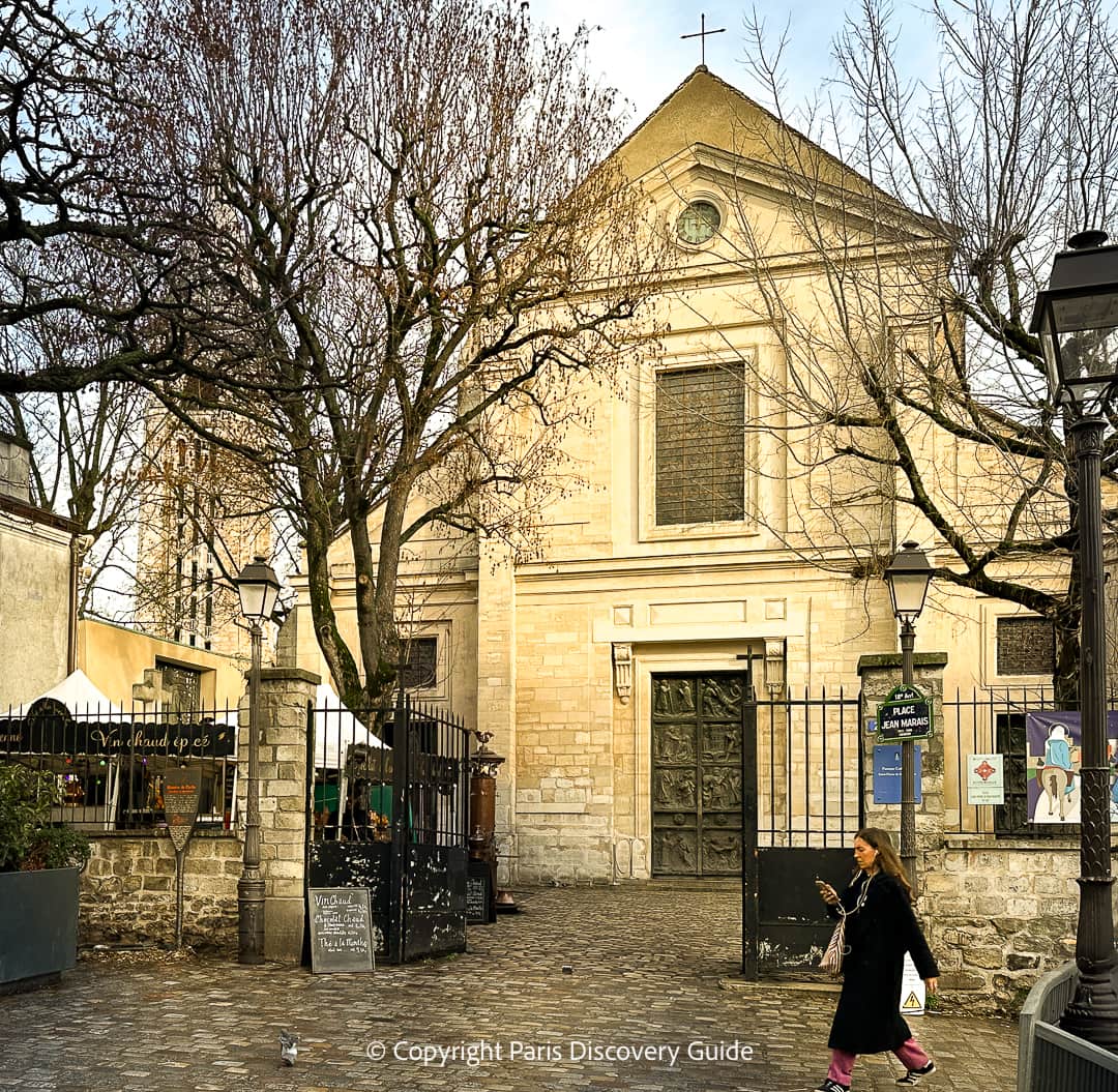 Touissaint flowers by a grave at Montmartre  Cemetery
