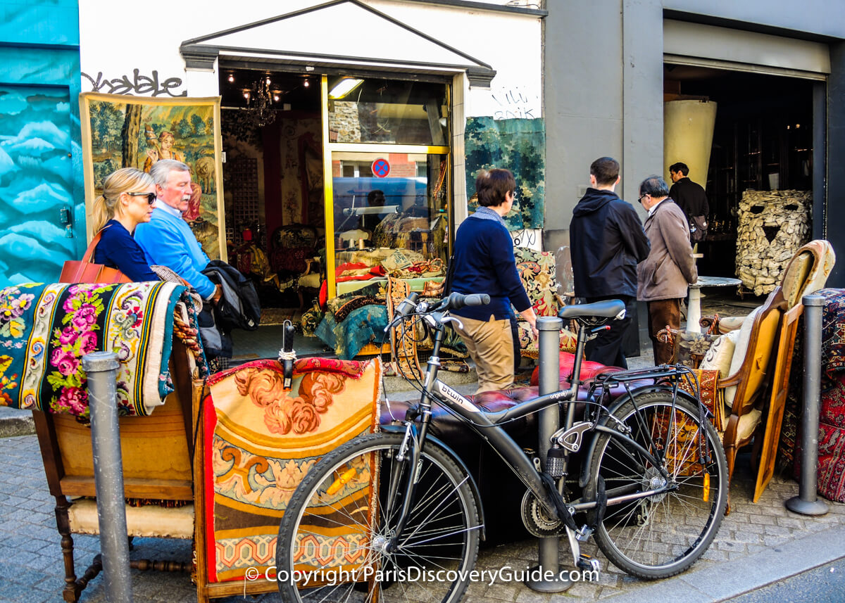 This Paris Flea Market Shop offers everything from tapestries and rugs to vintage furniture and chandeliers This Paris Flea Market Shop offers everything from tapestries and rugs to vintage furniture and chandeliers