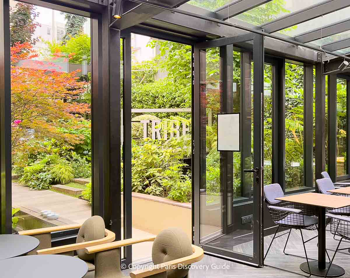 Breakfast room / co-working space at TRIBE Paris Bagatelles hotel <strong>Fall colors in Parc Clichy-Batignolles across from TRIBE Paris Bagatelles hotel</strong>