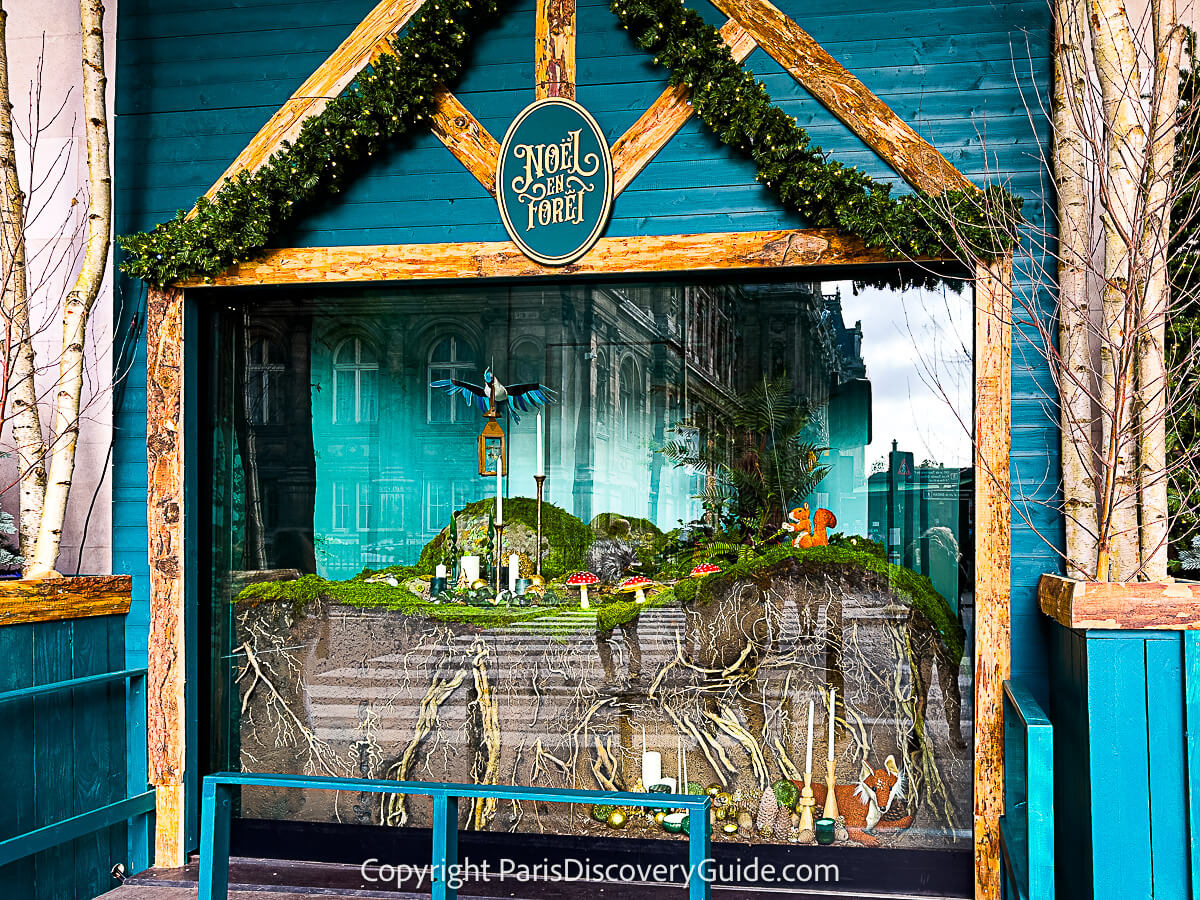 An above- and below-ground view of the forest in BHV Marais's Christmas window - and check out the tempting wooden candlesticks at the bottom right.