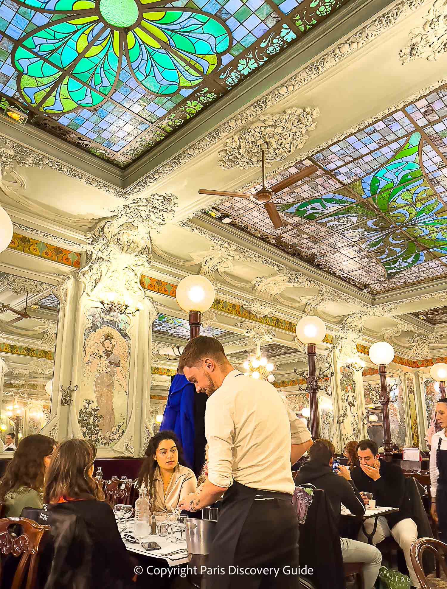 A slice of Bûche de Noël being served as dessert at "La Cuisine de l'E7" restaurant at Hotel Edouard VII near the Paris Opera House 
