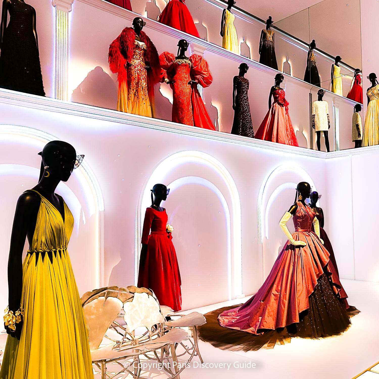 Gold and crimson gowns at Galerie Dior