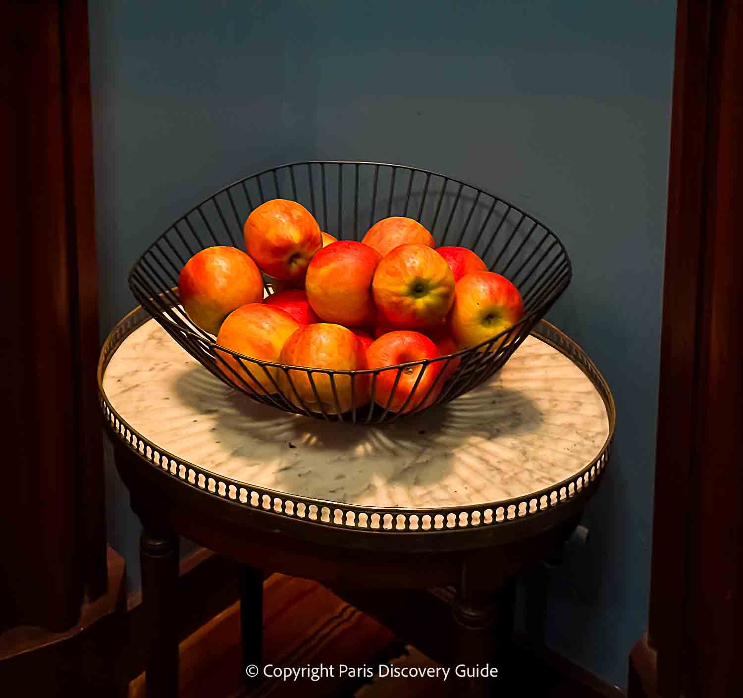 This bowl of apples in a dark corner between dark red velvet curtains reminded me of a Renaissance painting
