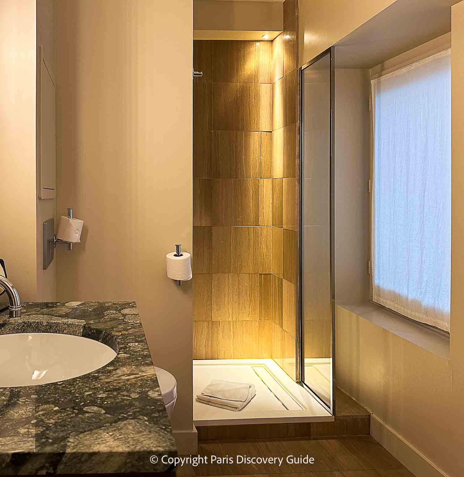 Hotel de Sully's garden in the Marais on a warm afternoon in late March