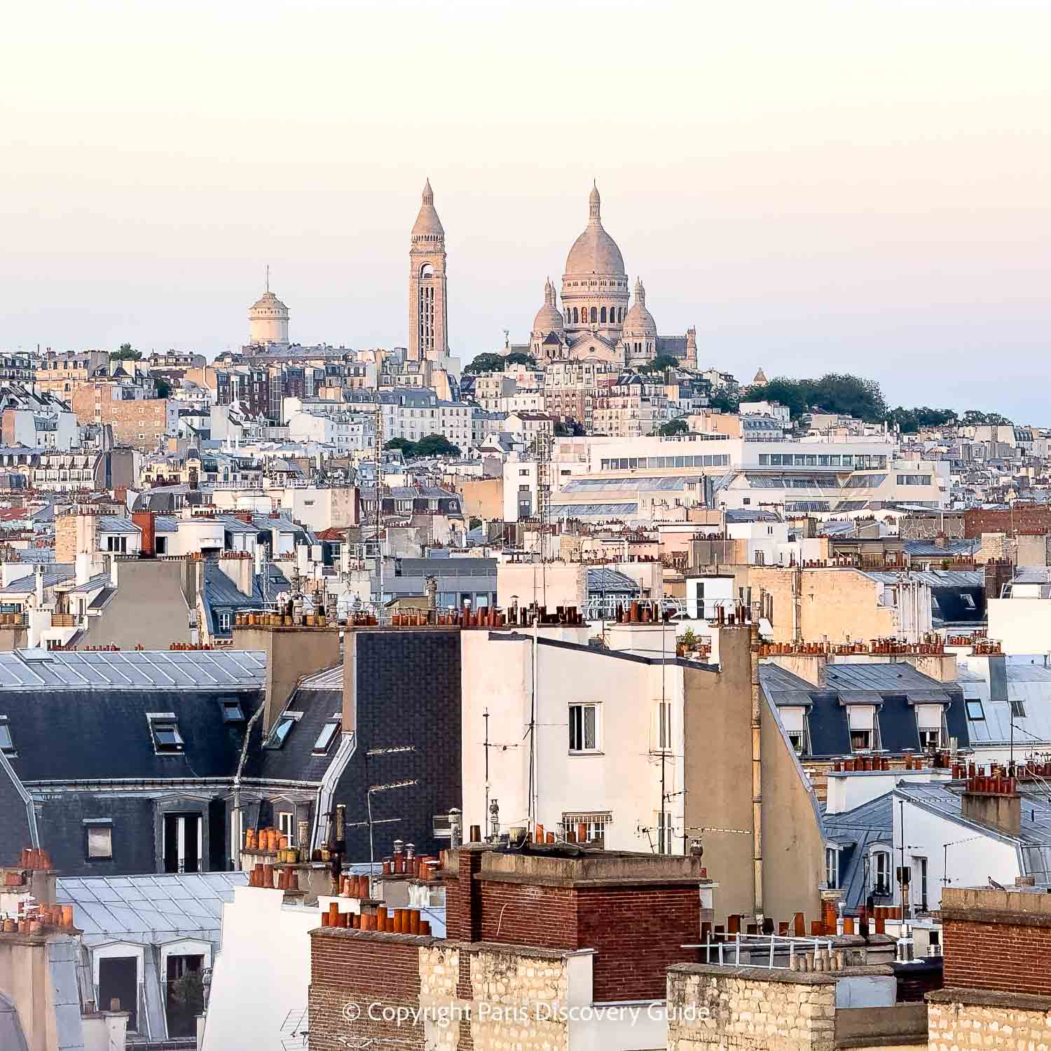 Skyline view of Sacre Coeur from the rooftop bar at La Fondation 