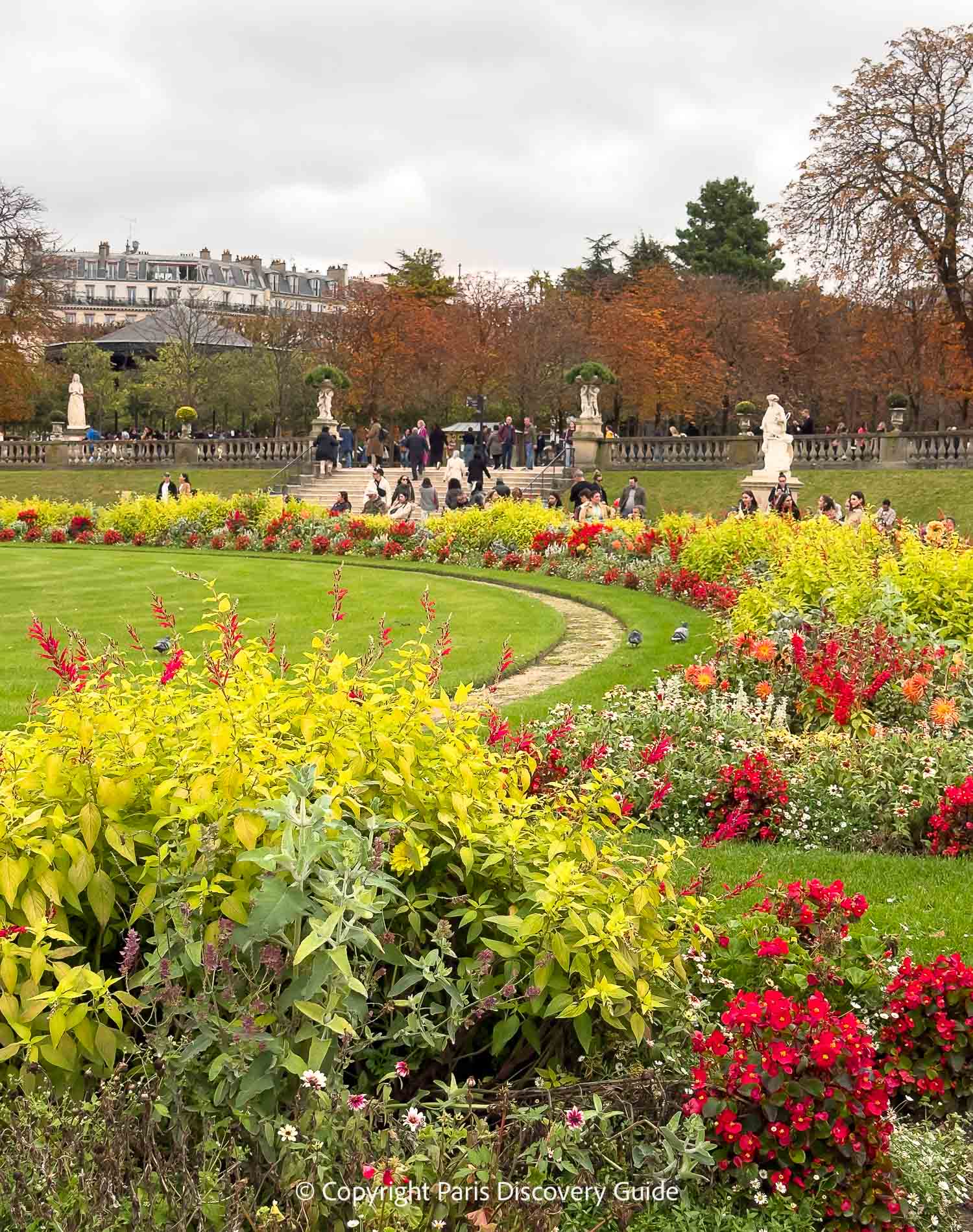 Fall foliage and fall flowers in Luxembourg Garden in mid-October