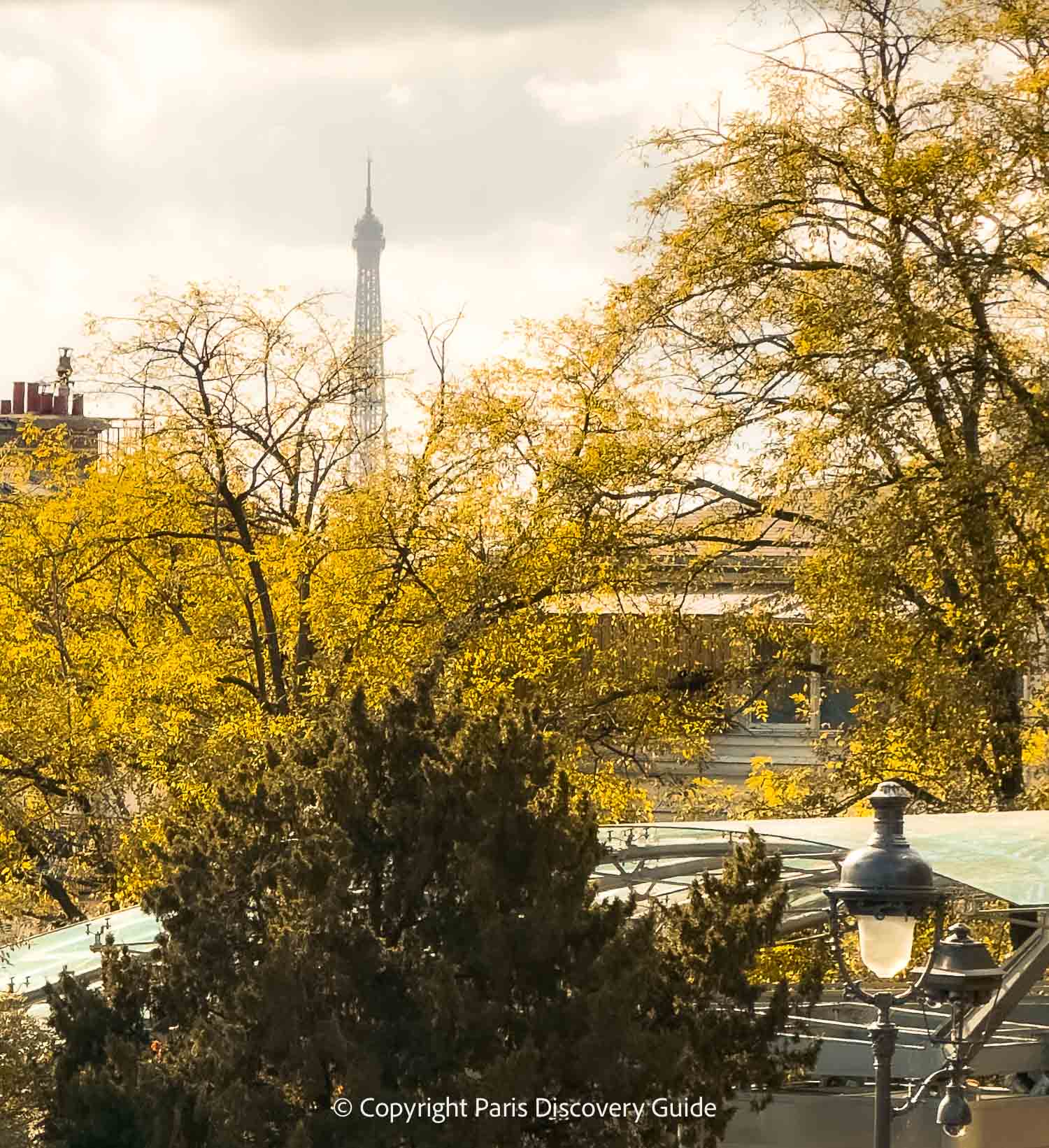 Fall foliage in Montmartre around Le Moulin Blute-Fin, a historical windmill