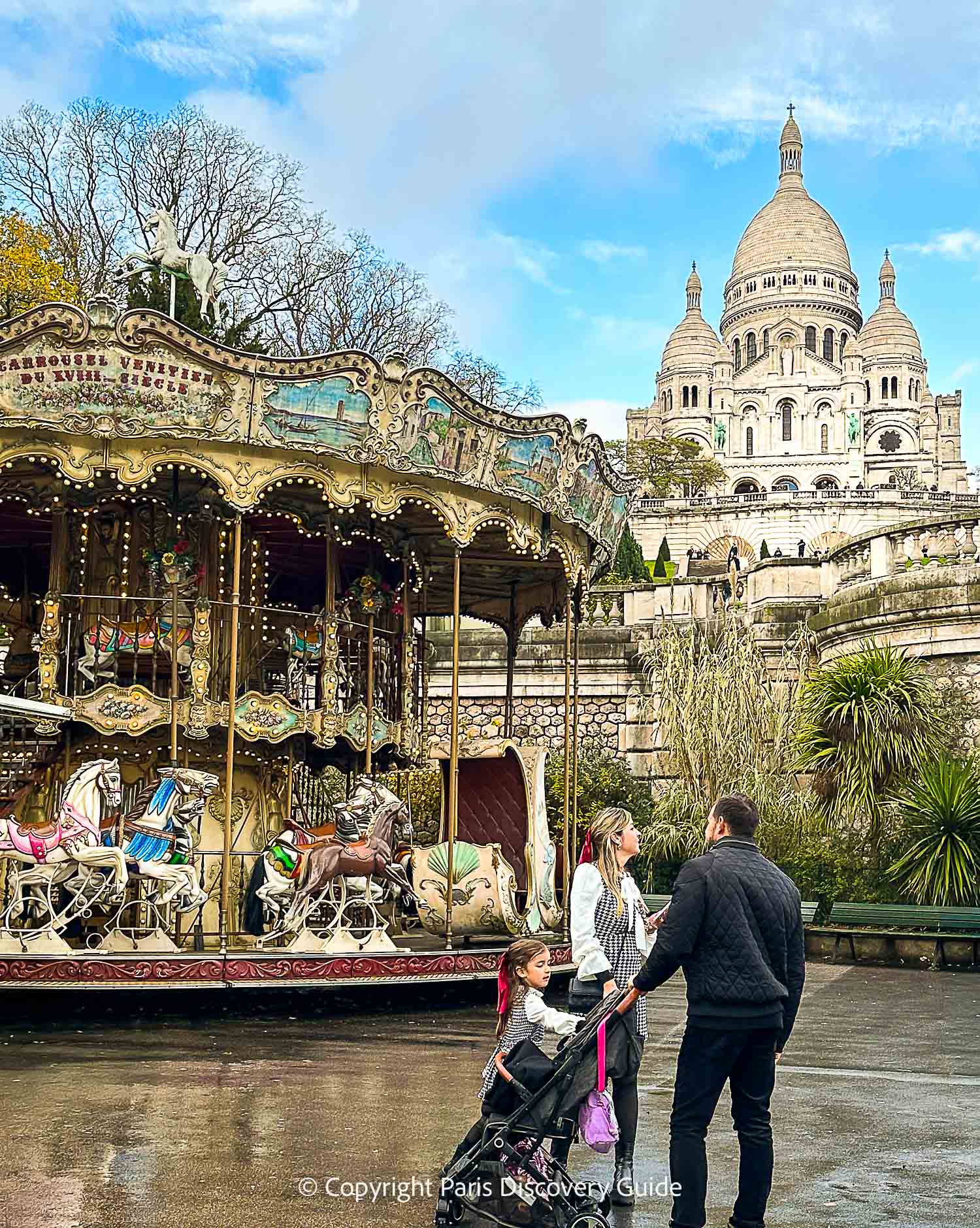 The carousel at Place Louis Michel at the foot of Sacre Coeur Basilica