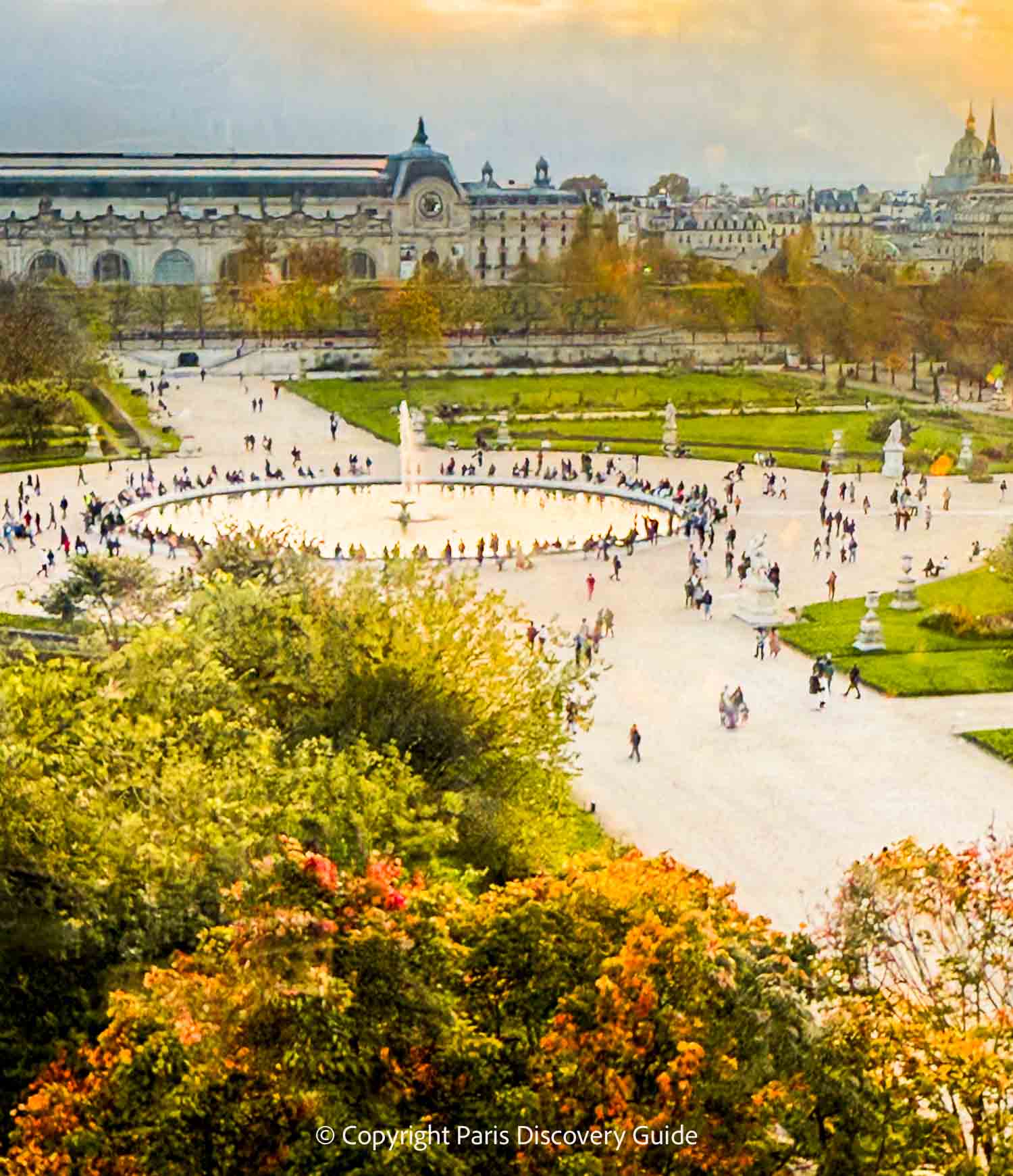 Tuileries Garden in November, photographed at the 'Golden Hour' from the top of the ferris wheel through the glass window Tuileries Garden in November, photographed at the 'Golden Hour' from the top of the ferris wheel through the glass window