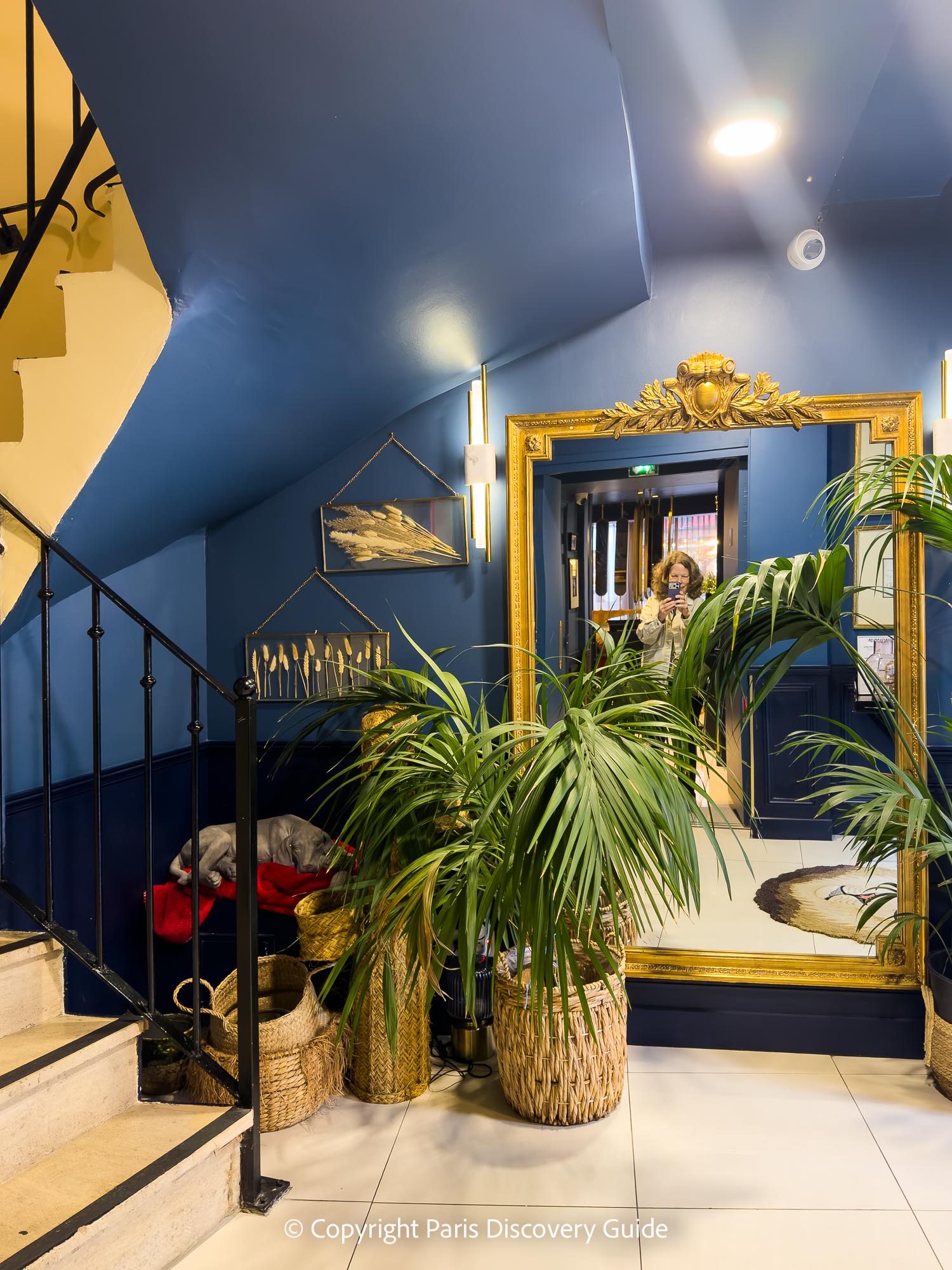 A small corner near the stairs and elevators at Welcome Hotel