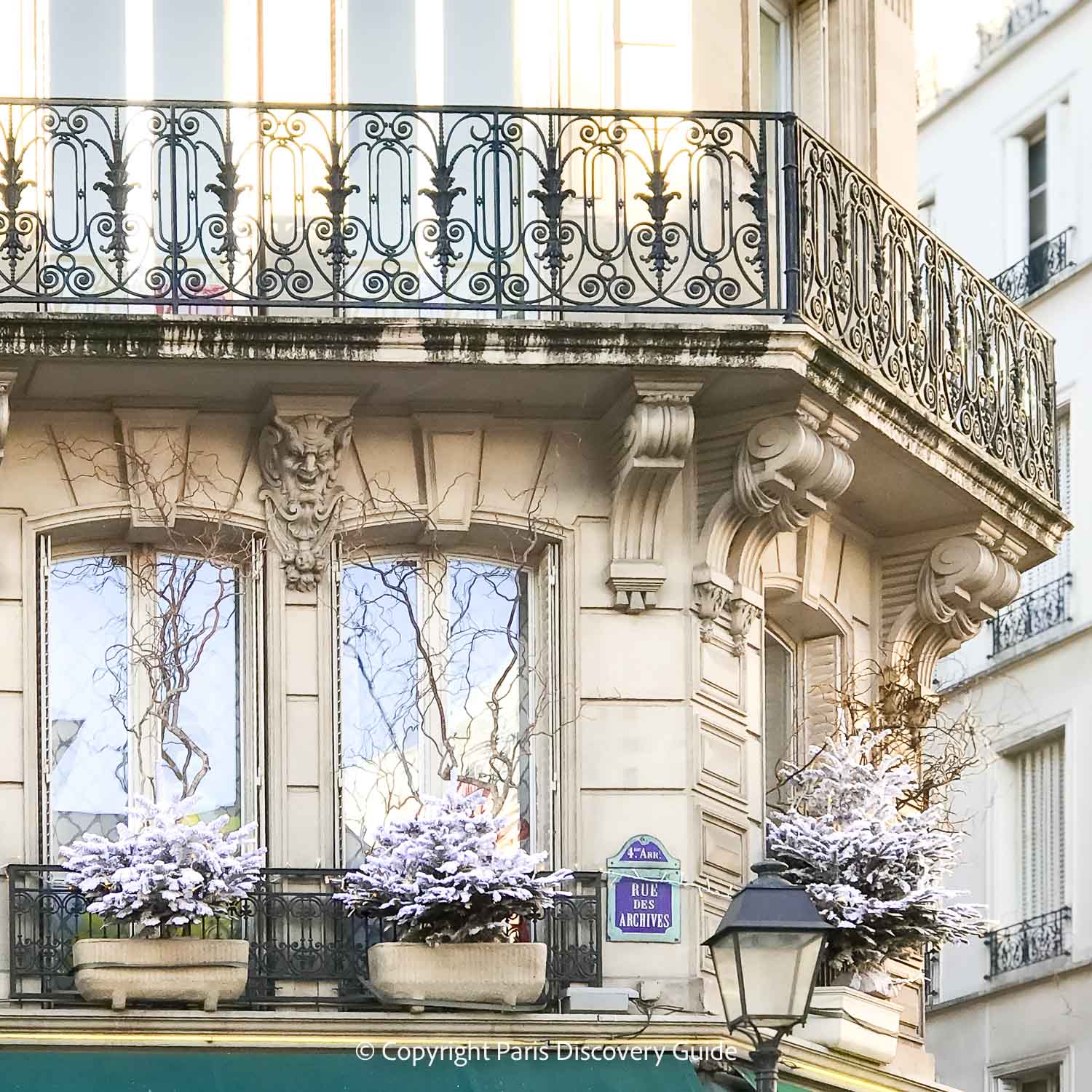 Christmas decorations in window boxes in the Marais