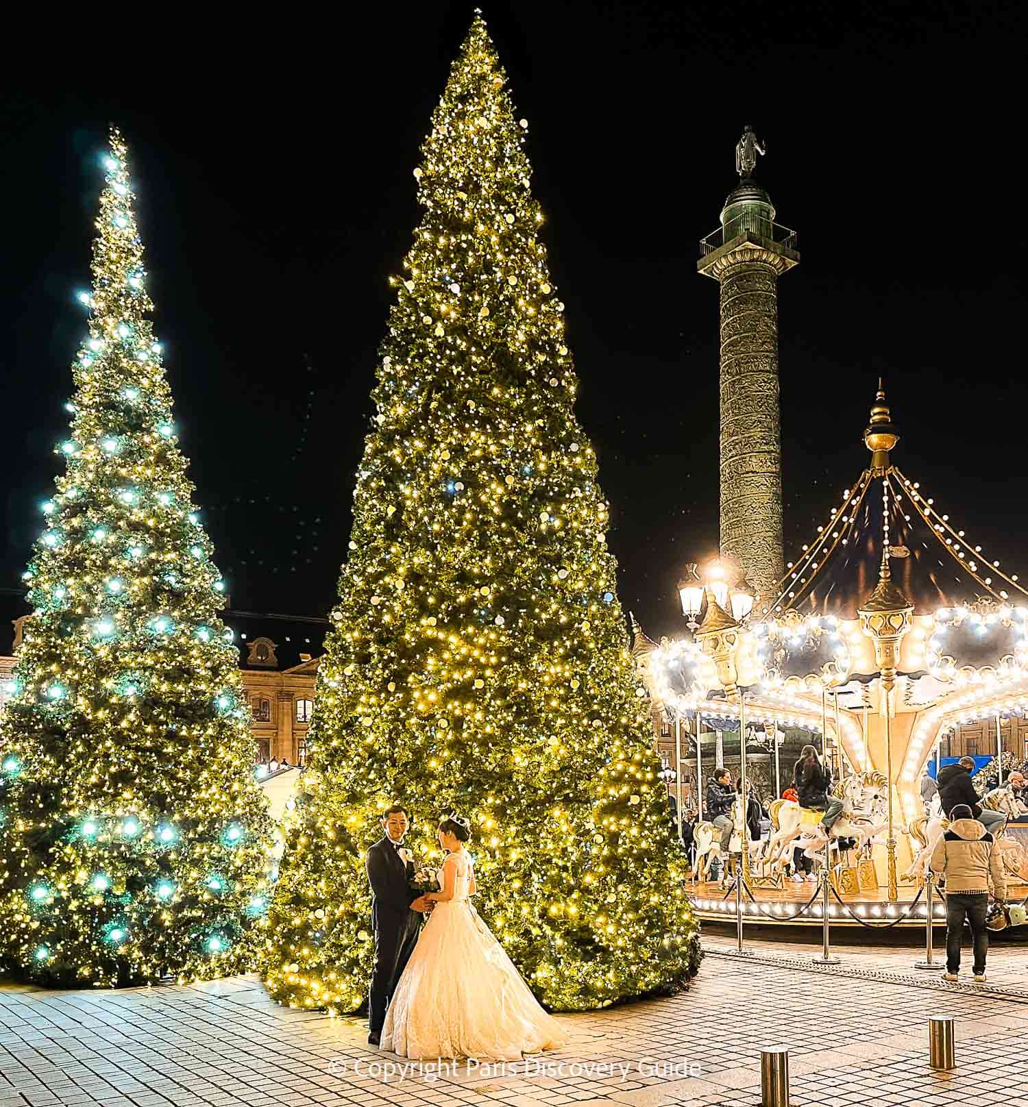 Place Vendome & its sparkly Christmas trees and carousel 