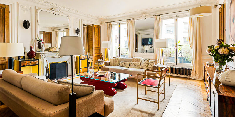 Spacious living room in the Ash & Timber apartment near Arc de Triomphe