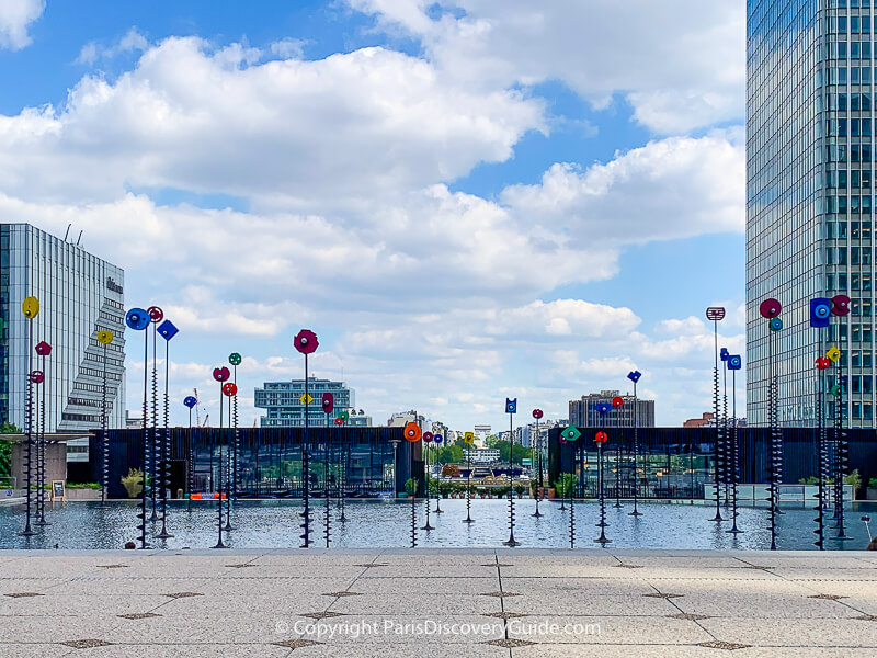 View down the La Defense Esplanade with the Arc de Triomphe in Paris in the distance