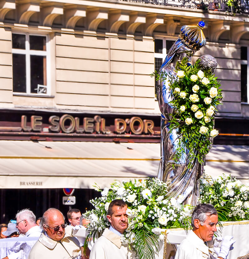Madonna and child statue in the Assomption Parade near Notre Dame Cathedral in Paris Madonna and child statue in the Notre Dame Cathedral in Paris