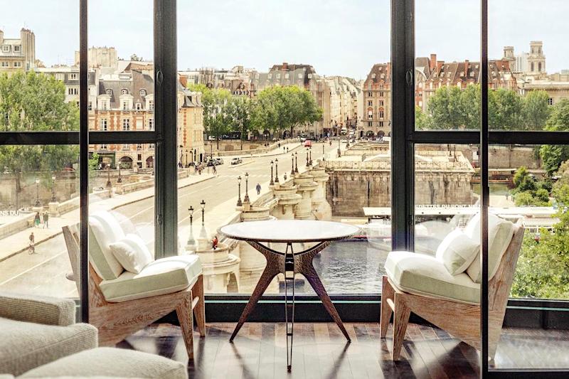 Private balcony at Le Cheval Blanc overlooking the Pont Neuf bridge and the Seine River
