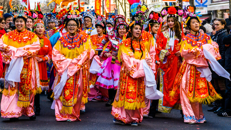 Ribbon dance troop marching in the Chinese New Year Parade in the 13th arrondissement in Paris Ribbon dance troop marching in the Chinese New Year Parade in the 13th arrondissement in Paris
