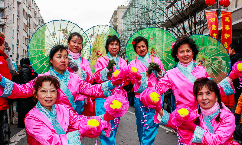 Dancers marching in the Chinese New Year Parade near Place d'Italie in the 13th arrondissement in Paris - Photo credit: Adrian Tombu, Creative Commons license