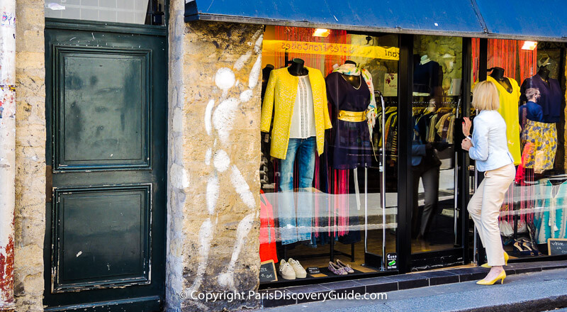 Window shopping in Paris's Latin Quarter Window shopping in Paris's Latin Quarter