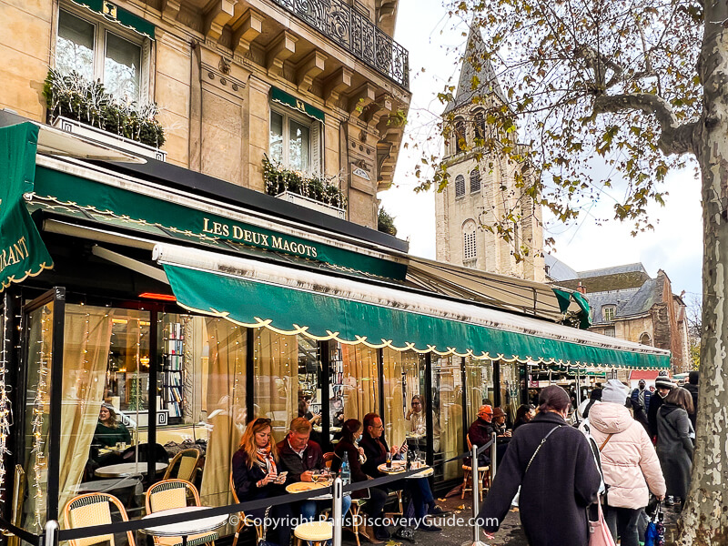 Les Deux Magots cafe in Saint Germain, where the cozy terrace stays warm even in November