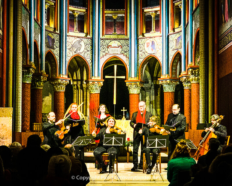 Musicians playing Christmas concert at Eglise Saint Germain des Prés