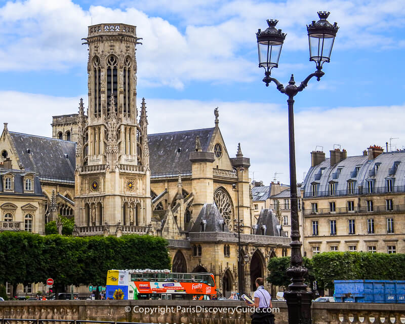 You can see a tiny glimpse of Relais du Louvre Hotel next to the church in this photo