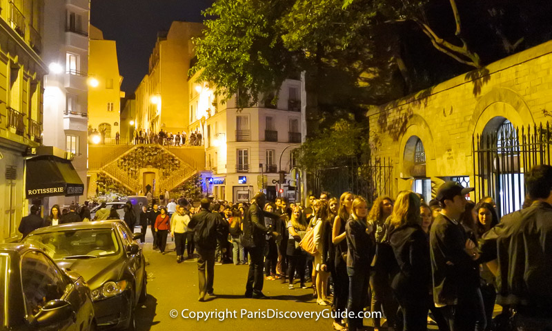 Crowd waiting in line for the 5th arrondissement's Bal des Pompiers held in Arènes de Lutèce