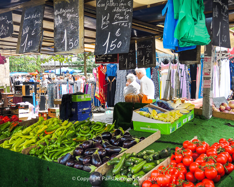 Fresh produce at Marché d'Aligré, with part of the Aligré flea market in the background