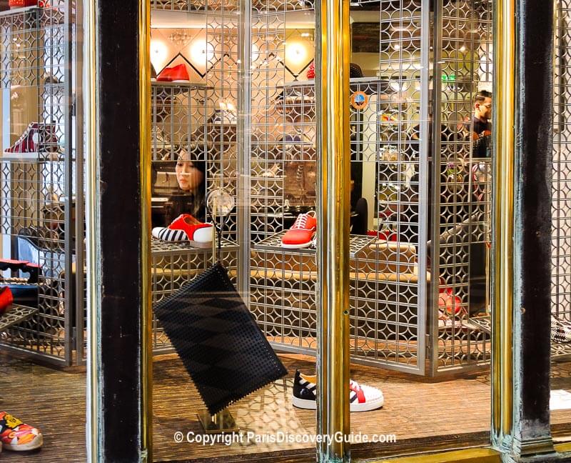 Louboutin shoes displayed in boutique at Galerie Véro Dodat, Paris covered passage Louboutin shoes displayed in boutique at Galerie Véro Dodat, Paris covered passage