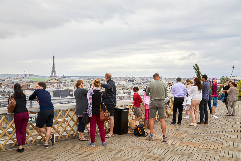View of Eiffel Tower and Paris skyline from Galerie Lafayette's rooftop terrace - Photo credit: iStock.com/AndreaAstes 
