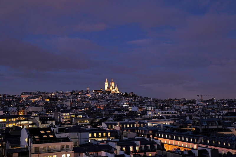 View of Sacre Coeur from the rooftop terrace at Galeries Lafayette - Photo credit: istockphotos.com/Maria Gribova