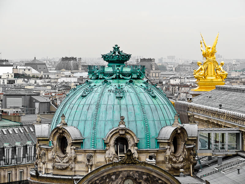 Skyline view of Palais Garnier (Paris Opera House) & other Paris rooftops from terrace at Galeries Lafayette - Photo credit: iStock.com/arndale
