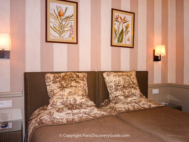Guestroom at Hotel des Deux Iles on Ile Saint-Louis near Notre Dame Cathedral Guestroom at Hotel des Deux Iles on Ile Saint-Louis near Notre Dame Cathedral