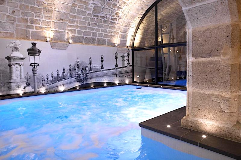 Indoor swimming pool at Hotel La Lanterne in Paris's Latin Quarter