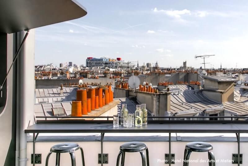 View from Hotel National des Arts et Métiers' bar of "les toits" - the rooftops - of Paris; you can see Centre Pompidoux in the distance View from Hotel National des Arts et Métiers' bar of "les toits" - the rooftops - of Paris; you can see Centre Pompidoux in the distance