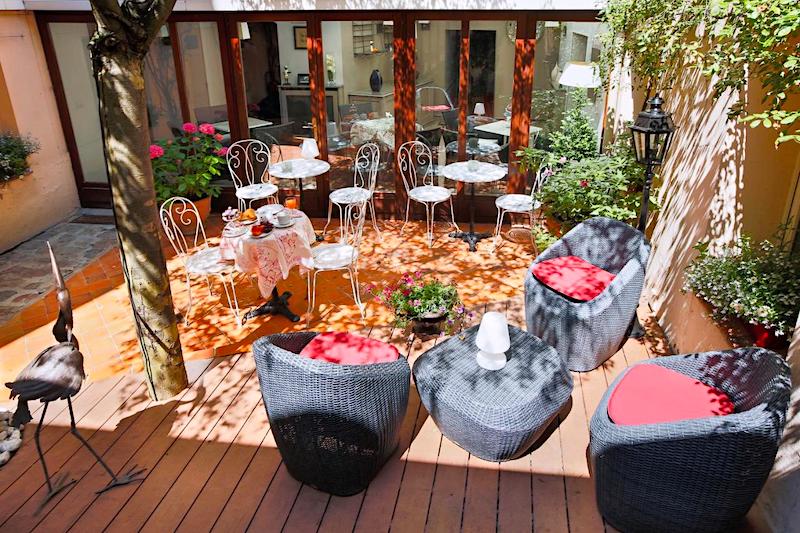 Terrace seating at La Residence Du Berry Terrace seating at La Residence Du Berry