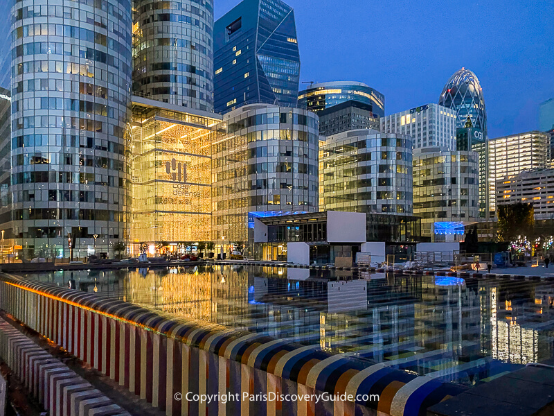 La Defense skyscrapers and reflecting pool on the Esplanade La Defense skyscrapers and reflecting pool on the Esplanade