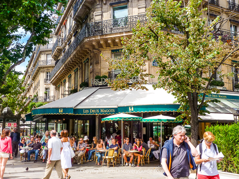 Les Deux Magots, across the plaza from Eglise Saint-Germain-des-Prés Les Deux Magots, across the plaza from Eglise Saint-Germain-des-Prés
