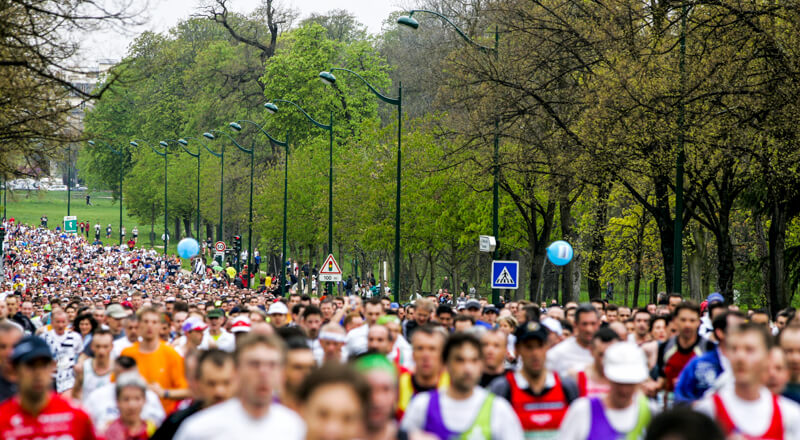 Paris Marathon runners pass through Bois de Vincennes Paris Marathon runners pass through Bois de Vincennes