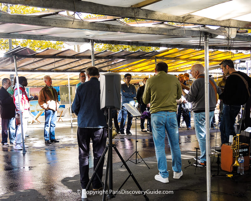 Musicians playing at Marché de la Creation Bastille, Paris's largest art market