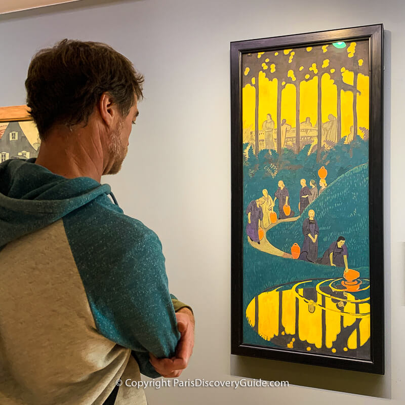 Post-Impressionist Paul Sérusier belonged to a group of young French artists called Les Nabis who felt art should involve symbolism and metaphors; you can see this trend, along with the use of almost-flat blocks of color, in his 1899 painting Women at the Source Post-Impressionist Paul Sérusier belonged to a group of young French artists called Les Nabis who felt art should involve symbolism and metaphors; you can see this trend, along with the use of almost-flat blocks of color, in his 1899 painting Women at the Source