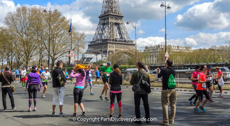 Paris Marathon, with iconic Eiffel Tower views in the background Paris Marathon, with iconic Eiffel Tower views in the background